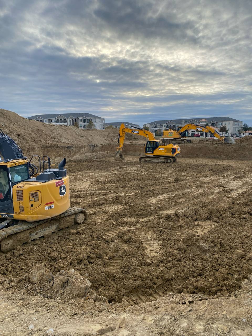 Three Renu Texas excavators on a real earthwork job site